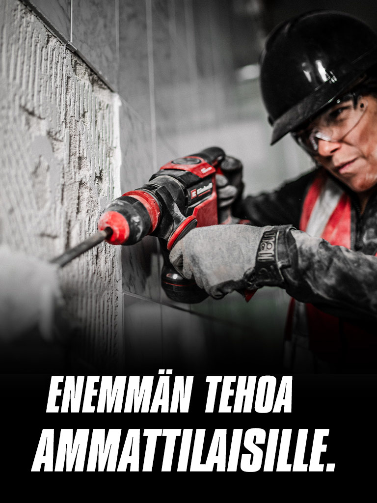 Henkilö, jolla on suojalasit ja kypärä, poraa punaisella porakoneella seinään. Kuvassa teksti "Enemmän tehoa ammattilaisille".